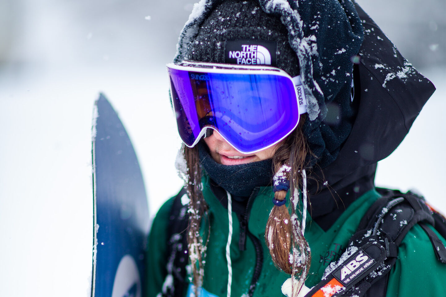 woman snowboarder with goggles