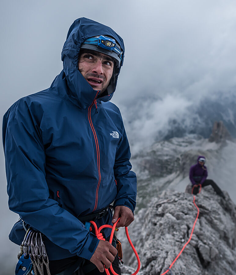 Man climbing in The North Face gear with FuseForm